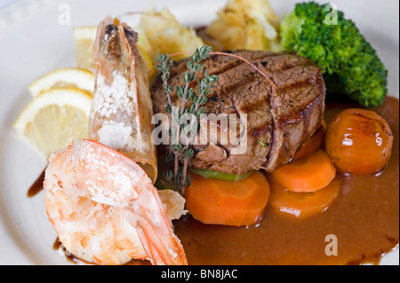 Closeup detail of a surf 'n' turf a la carte meal Stock Photo