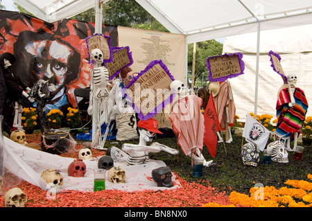 Skeletons representing mexican persons protesting against the government on the Megaofrenda at CU Stock Photo