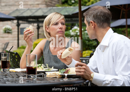 Couple lunching at hotel outdoors Stock Photo