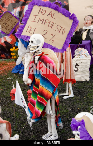 Skeletons representing mexican persons protesting against the government on the Megaofrenda at CU Stock Photo