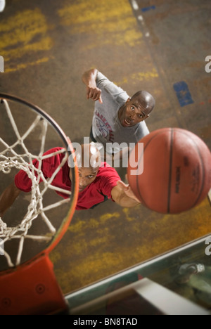 Men playing basketball Stock Photo