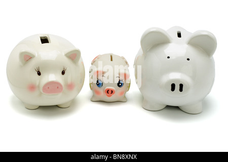 Family of piggy banks on white background Stock Photo
