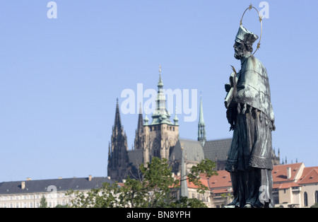 Prague - st. John Nepomuk from Charles bridge and st. Vitus cathedral Stock Photo