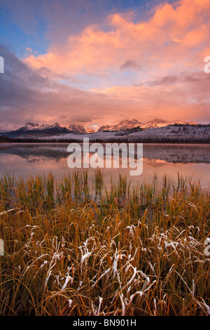 Sawtooth mountains sunrise reflection in little red fish lake, Idaho Stock Photo