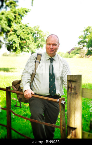 portrait of a Suffolk mole catcher standing by a gate Stock Photo