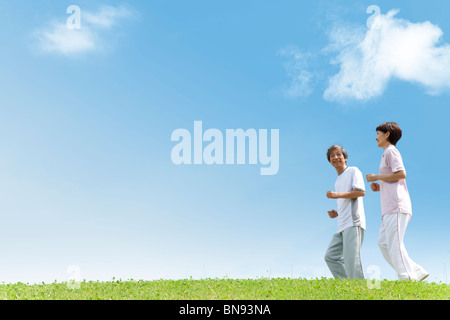 Mature couple jogging Stock Photo