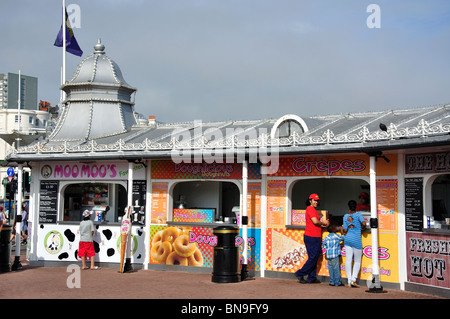 Takeaway food kiosks at pier entrance, Brighton Pier, Brighton, East Sussex, England, United Kingdom Stock Photo