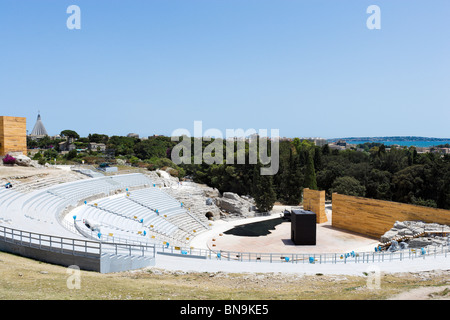 The Greek Theatre (Teatro Greco) set up for a seasonal performance, Parco Archeologico della Neapolis, Syracuse, Sicily, Italy Stock Photo