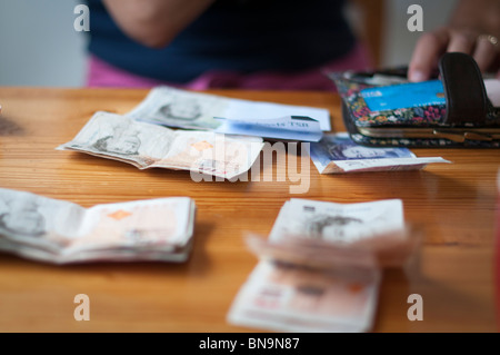 Person managing finances Stock Photo