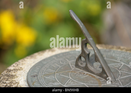 Weeping Ash Garden, England. Close up view of a sundial at Weeping Ash Gardens. Stock Photo