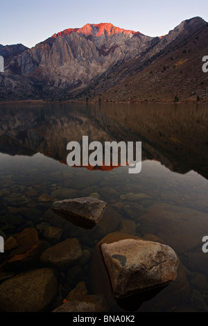 Sunrise at Convict Lake Sierra mountians in the background. Stock Photo