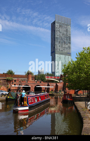 The Bridgewater canal at Castlefields Manchester with the Beetham Tower in the background