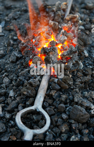 Fire in a blacksmith forge Stock Photo