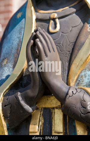 Statue of Our Lady of Guadalupe in front of the St. Jane de Chantal Catholic Church in Abita Springs, Louisiana Stock Photo