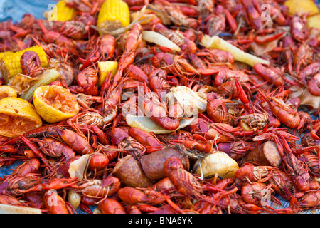 New Orleans, LA - Mar 2009 - Piles of boiled crawfish ready to eat at party in New Orleans, Louisiana Stock Photo