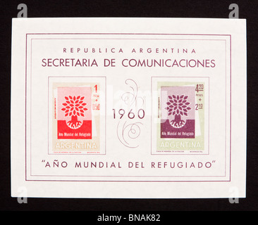 Semi-postage souvenir sheets and stamps from Argentina depicting an uprooted oak, for the World Refugee Year. Stock Photo
