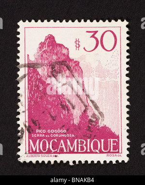 Postage stamp from Mozambique depicting Gogogo Peak. Stock Photo