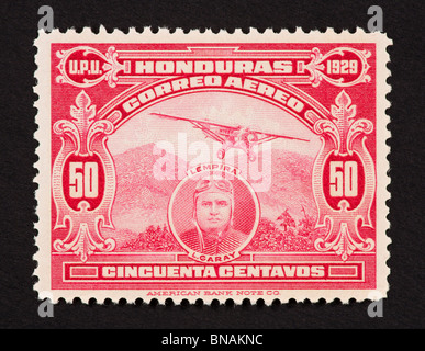 Postage stamp from Honduras depicting a monoplane and Lisandro Garay. Stock Photo