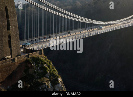 Traffic and pedestrians crossing the dramatic Clifton suspension bridge over the Avon gorge In Bristol Stock Photo