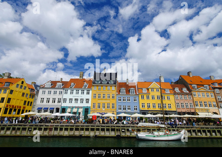 Dramatic cloud formation over beautiful Nyhavn quayside in Copenhagen, Denmark Stock Photo