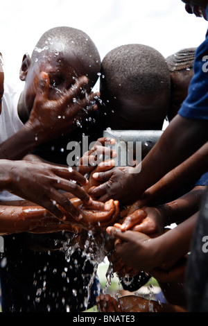 children, drinking, water, Sierra Leone, West Africa, Stock Photo