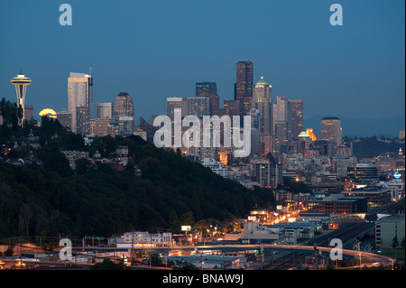 Seattle skyline with moon rising over city. Stock Photo