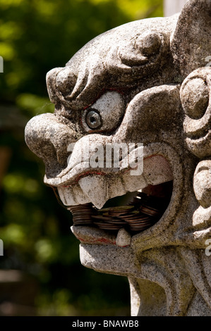 Shinto Shrine Guard Lion Dog sculpture protecting the Shrine entrance Granite Falls Washington State USA Stock Photo