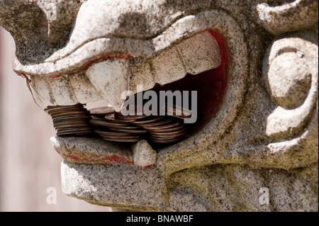 Shinto Shrine Guard Lion Dog sculpture protecting the Shrine entrance Granite Falls Washington State USA Stock Photo