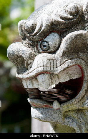 Shinto Shrine Guard Lion Dog sculpture protecting the Shrine entrance Granite Falls Washington State USA Stock Photo