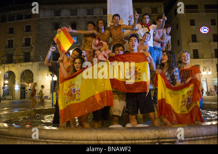 Spanish fans celebrate Spain's win over Germany in the FIFI World Cup semi finals. Passeig del Borne, Palma, Mallorca, Spain. Stock Photo