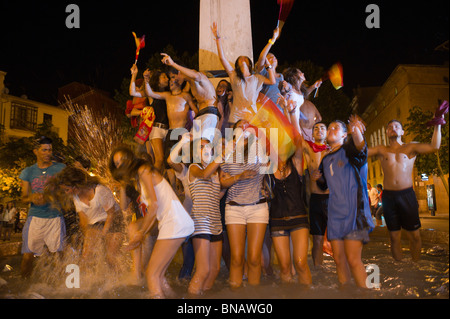 Spanish fans celebrate Spain's win over Germany in the FIFI World Cup semi finals. Passeig del Borne, Palma, Mallorca, Spain. Stock Photo