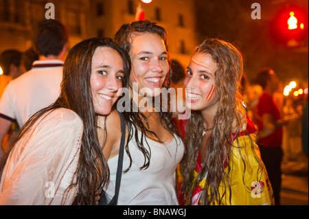 Spanish fans celebrate Spain's win over Germany in the FIFI World Cup semi finals. Passeig del Borne, Palma, Mallorca, Spain. Stock Photo