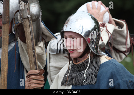 Young Woman dressed in Medieval Armour before the Battle of Tewkesbury Re-enactment, 2010 Stock Photo