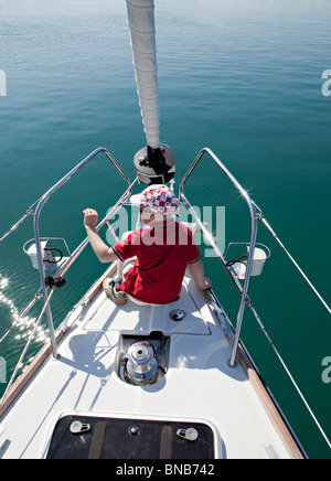 Boy on yacht Stock Photo