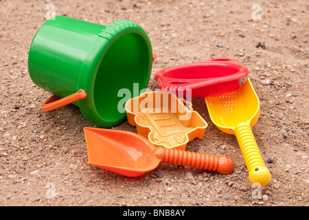 beach toys on send Stock Photo - Alamy