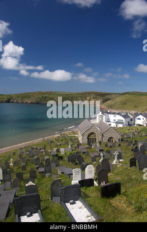 Aberdaron View of St Hywyn's Church, beach and bay behind Llyn Peninsula Gwynedd North Wales UK Stock Photo