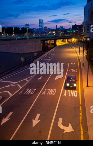 Boston, Massachusetts - A car on a freeway exit ramp in South Boston. Stock Photo