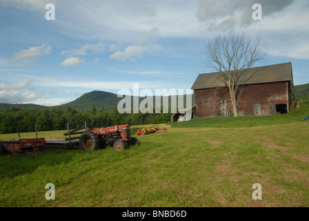 A tractor sits idle in this farm scenic. Stock Photo