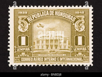 Postage stamp from Honduras depicting the hospital at Cholutega. Stock Photo