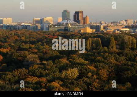 Skyline of Potsdamer Platz with Sony Center, view over the trees of the autumnlal Grosser Tiergarten Park, Berlin, Germany. Stock Photo