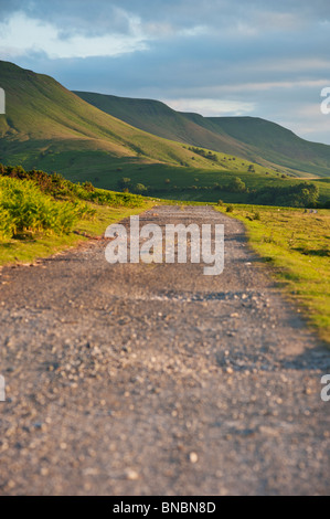 Gravel road below hay bluff with Black mountains in Backround, Brecon Beacons national park, Wales Stock Photo