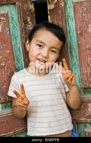 A small Uighur boy in Kasghar, China. Stock Photo