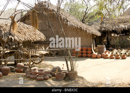 Myanmar, Pakokku, thatch Houses on the banks of the Chindwin river Stock Photo