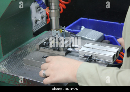 Semi Automated Fixture used to rivet Movement Assembly of Speedometer Stock Photo