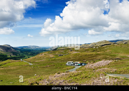 Tourists at Hardknott Pass Roman Fort in The Lake District Cumbria England UK Stock Photo