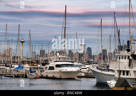 Beautiful colors wash over the Seattle skyline and Elliott Bay Marina on a summer evening at sunset. Stock Photo