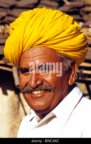 Varying styles of turbans denote region and caste This prominant man in Rajasthan wears a seasonal color India MR Stock Photo
