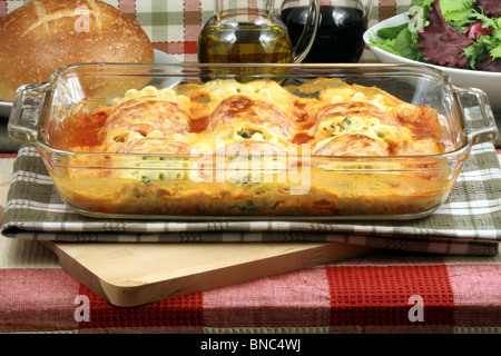 italian lasagna rolls made with tomatoes spinach and ricotta cheese Stock Photo