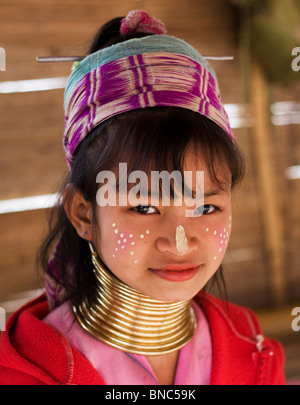 Young girl from the Padaung long neck hill tribe with traditional face markings, Tha Ton, Chiang Mai Province, Thailand Stock Photo