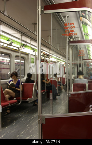 inside subway metro train red Stock Photo